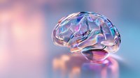 Translucent glass brain model with iridescent reflections on soft pink and blue background showcases medical science and neurology concepts for healthcare presentations.