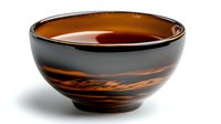 Elegant ceramic bowl with amber and black swirl pattern, glossy finish and rounded shape for serving soups, desserts, or decorative display.