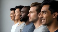 Diverse group of young professional men standing in profile showing teamwork unity and collaboration in modern workplace environment.