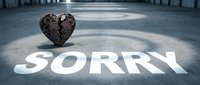 Mechanical broken metal heart with gears beside the word SORRY painted on concrete floor, symbolizing apology, regret, and emotional repair.