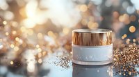 Luxury cosmetic cream jar on sparkling golden bokeh background with glitter particles, elegant skincare product photography for beauty advertising.