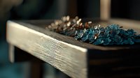 Dried blue hydrangea petals and pine cones arranged on rustic wooden shelf, moody atmospheric composition with selective focus and natural lighting.