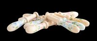 Wooden rolling pins with colorful floral patterns isolated on transparent background, ready for kitchen design, sublimation, print-on-demand products, t-shirt graphics, and craft projects.