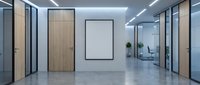 Modern office interior with glass partitions, wooden doors and blank white frame on wall for corporate branding and professional workspace design.