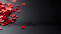 Red paper hearts scattered on dark background with selective focus and copy space, romantic Valentine's Day concept for greeting cards and social media posts.