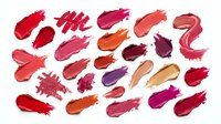 Colorful lipstick smears and makeup brush strokes collection isolated on white background for cosmetic design projects and beauty campaigns.