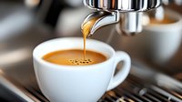 Fresh espresso pouring from coffee machine into white ceramic cup, creating golden crema with perfect droplets. Close-up shot shows rich texture and aroma.