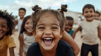 Joyful diverse group of elementary school children laughing and playing outdoors, expressing genuine happiness and friendship during playtime. Natural candid moment.