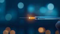 Medical syringe with glowing needle on dark blue bokeh background, vaccination and healthcare concept for medical presentations and articles.