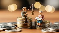 Miniature elderly couple sitting on coin stacks with fishing rod and dollar sign, representing retirement planning and financial security concept.