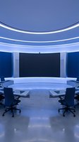 Modern blue television news studio with curved desk and professional lighting for broadcast media production.