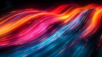 Abstract colorful light waves in motion with vibrant red, orange, pink and blue streaks flowing against dark background, creating dynamic energy pattern.