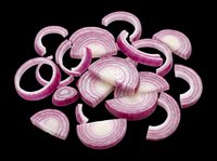 Sliced red onion rings scattered on transparent background, isolated and ready for food design, stickers, t-shirt prints, clipart, and print on demand projects.