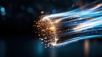 Glowing optical fiber strands with light particles and bokeh effects on dark background, showcasing digital connectivity and data transmission technology.