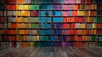 Colorful rainbow bookshelf wall with vintage books arranged by color spectrum from red to purple, empty wooden floor perfect for education, library or knowledge concept backgrounds.