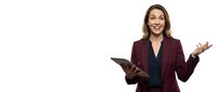 Professional businesswoman in burgundy suit holding tablet presenting with open gesture on white background isolated for corporate design use.