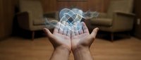 Hands presenting holographic cloud computing network with interconnected nodes floating above palms in modern living room setting for technology concepts.