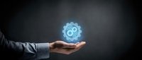 Businessman hand presenting glowing blue gear mechanism with recycling symbol for sustainable business solutions and environmental technology concepts.