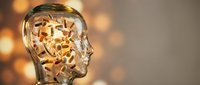 Transparent glass head filled with golden gears and mechanical parts representing artificial intelligence, innovation and creative thinking process.