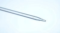 Surgical stainless steel needle with sharp pointed tip on white background, used for medical procedures, injections, and healthcare applications.