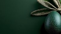 Elegant green Easter egg with gold speckled pattern and metallic ribbon leaves against dark green background, perfect for holiday designs.