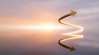 Golden arrow following upward curved path against serene sunset sky, symbolizing growth, progress, and strategic business direction for corporate success and financial advancement.