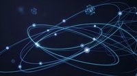 Atom structure with glowing electrons orbiting nucleus on dark background, representing science, physics, molecular research, and technology concepts for educational and scientific applications.