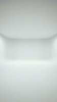 Clean white minimalist interior corner with curved edges and soft lighting creating subtle shadows for modern architectural design backgrounds.
