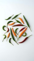 Fresh colorful chili peppers arranged on white background for culinary and cooking projects. Spicy hot peppers in green, red and orange colors.