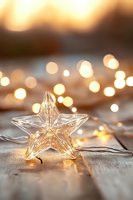 Crystal star light decoration on rustic wooden surface with warm glowing bokeh background, creating magical holiday atmosphere for festive designs.
