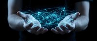 Businessman hands holding glowing digital network connections with blue light effects representing technology innovation and data connectivity solutions.