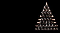 Golden and bronze metallic spheres arranged in triangular Christmas tree shape on black background for holiday decorations and festive designs.