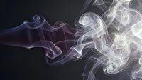 Abstract smoke waves flowing from dark purple to white on black background, suitable for motion graphics, digital art, and visual effects projects.