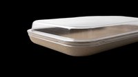 Disposable aluminum food container with clear plastic lid, isolated on transparent background. Ready for packaging design, print-on-demand, and commercial use applications.
