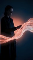 Woman with long dark hair, appearing to be of East Asian descent, wearing dark clothing, manipulating glowing neon light waves with her hands against a dark blue background. Suitable for technology, innovation, and digital transformation concepts.