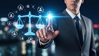 Professional businessman touching digital justice scales with network connections representing legal technology and corporate law services.