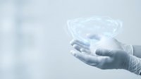 Medical professional hands in gloves holding holographic brain model for neurology healthcare technology and digital medicine innovation.