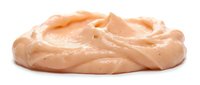 Creamy peanut butter spread isolated on white background, ready for food packaging, recipe blogs, and culinary design projects.