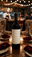 Wine bottle with blank label on elegant restaurant table with candles, burgundy napkins and chef cooking in background kitchen with string lights.