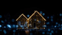 Illuminated house silhouette with warm string lights against dark background with blue bokeh effect, creating festive holiday atmosphere.