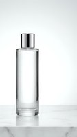Clear glass perfume bottle with silver cap on marble surface isolated on white background for cosmetic product photography and branding design.