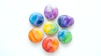 Colorful watercolor spheres arranged in circle on white background, isolated design elements for creative projects, artwork, and digital compositions.