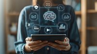 Digital technology icons floating over tablet in hands, showing brain, mail, analytics and media symbols in glowing blue interface. Modern business communication concept.