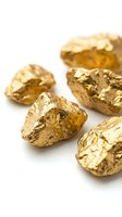 Golden nuggets scattered on white background showcasing precious metal mining wealth and luxury investment opportunities for financial concepts.