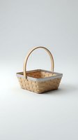 Empty wicker basket with handle on neutral background for storage organization and home decor projects.