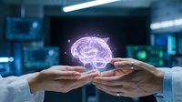 Healthcare professionals hands protecting glowing brain hologram in modern medical laboratory representing neuroscience research and mental health innovation.