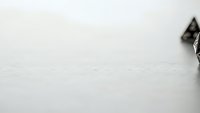 Minimalist white textured paper background with subtle grain and soft lighting creating clean space for text overlay and graphic design projects.