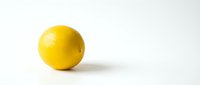 Fresh yellow lemon fruit isolated on clean white background for healthy cooking and citrus design projects.