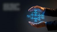 Business professional hands protecting glowing blue digital network diagram with connected nodes and data flow symbols for technology presentations.