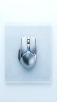 Sleek silver gaming mouse with ergonomic design on white background, isolated and ready for web, print, and product marketing use.